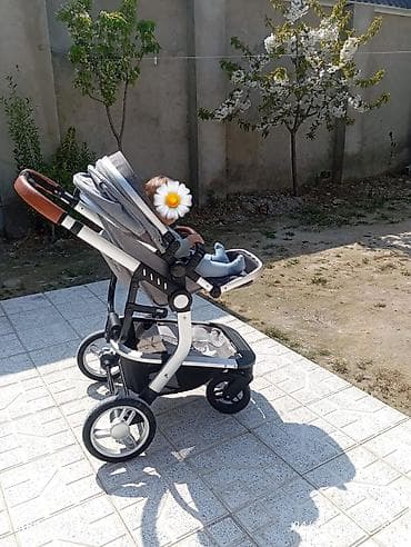 Sehla Teknum 2/1 kolyaska satilir seliqeli islenib baha alinib 180azn
