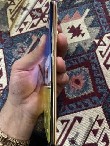 мини телефон: Infinix Zero 30, 256 GB, rəng - Qızılı, Sensor — 5