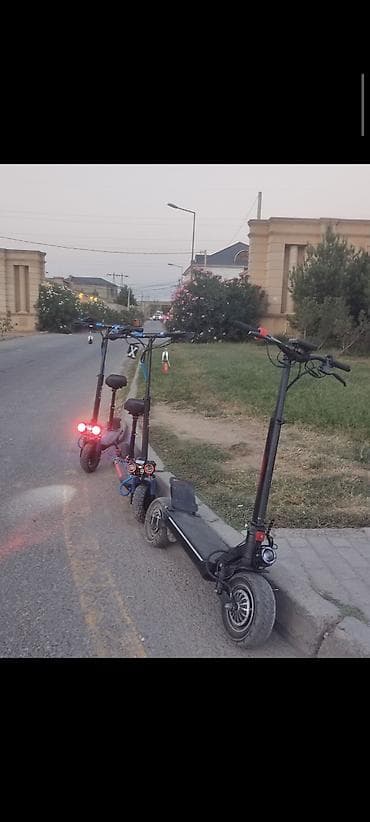 Elektrikli samokatlar: (TEZEDİR 4 AYDIRKİ ALINB) Rvokda maşını bele aparır 2mator işdiyir — 3