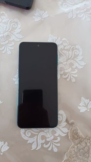 вытяжка для кухни в баку: Arxa tərəfində kvadrat formalı kamera modulu olan parlaq firuzəyi — 2