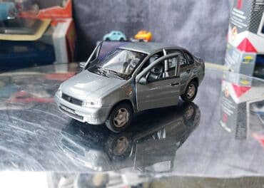 metbex tavan modelleri: Коллекционная модель Lada Kalina VAZ1118 silver 2004 Welly Scale — 14