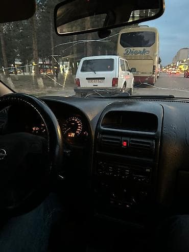 uaz diski: Opel Astra Caravan (Universal) – bordo rəng, geniş və praktik ailə — 6