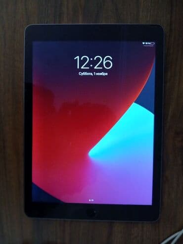 Apple iPad: Apple iPad planşet model A1566 - Touch ID düyməli 9.7 düym ekran - — 1