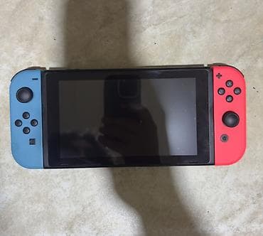 nini: Nintendo switch V2 satilir islemeyinde problem yoxdur, kabro ve dasima — 1