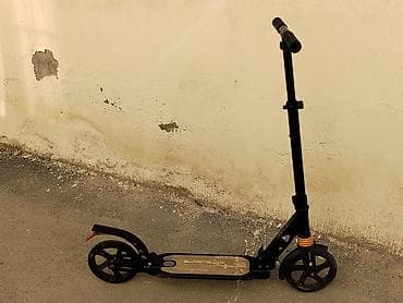 samokat satisi: Şəhər içi hərəkət üçün mexaniki skuter. Xüsusiyyətlər: - Qara rəngli — 3