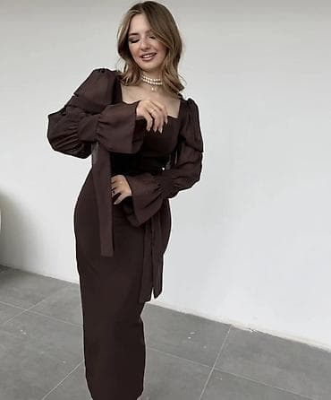 Qəhvəyi rəngli zərif midi don M razmer,alınıb,geyinilməyib. Etiket