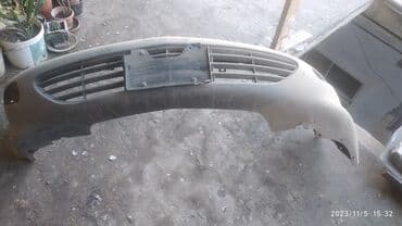 бампер на гольф 3: Ön, Chevrolet 1998 il, ABŞ, Ünvandan götürmə — 1
