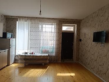 шеки: 1 otaqlı mənzil – studiya mətbəx, yataq otağı və sanitar qovşağı — 2