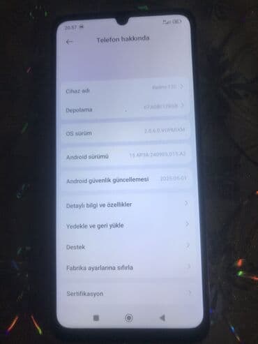 redmi note 15 pro max qiyməti: Redmi markalı smartfon. Telefonun arxa tərəfində "Redmi" loqosu və — 5