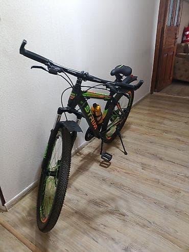 STRIM dağ velosipedi 26 lig - Geniş, dişli təkərlər ilə off-road və