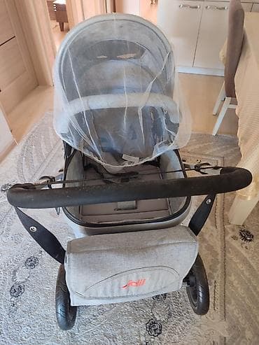 usaq koyneyi: Çıxarıla bilən beşikli araba — 3