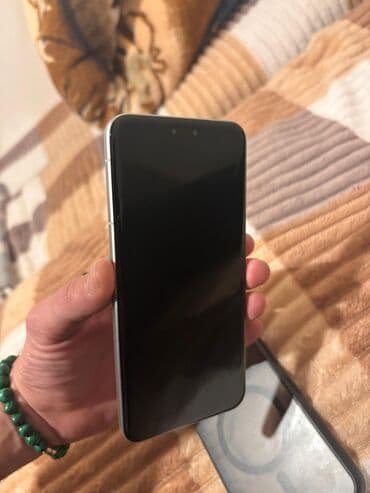 redmi 13 kabro: Məhsul: Smartfon (qara ön panel, gümüş rəngli düz çərçivə) Honor Magic — 4