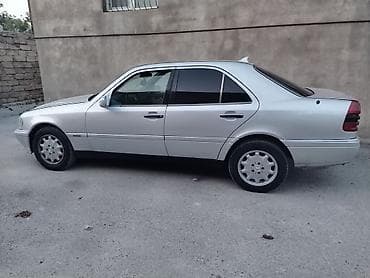 bmw x5 e53: Mercedes-Benz C-Class: 2.2 l | 1996 il Sedan — 7