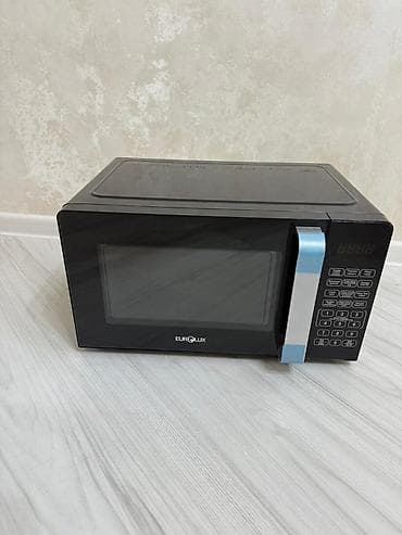 ari sobalari: Mikrodalğalı soba Eurolux, Ayrıca dayanan, Mikrodalğalar ilə, rəng - Qara, Yeni — 1