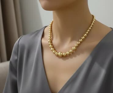 Qızılı rəngli boyunbağı. Yenidir. Qiymeti razılaşmaq olar. Ünvan