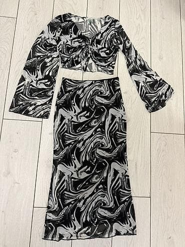 ağ qadın kostyumları: İki hissəli qadın dəsti – top və ətək S-M razmer türk malıdır 1 defe — 1