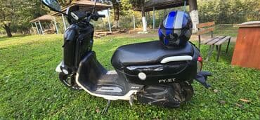 hibrit masinlar turbo az: Skuter FY-ET - Rəng: Qara-ağ iki­rəng dizayn - Gediş mövqeyi: Aşağı — 4