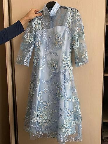 Zərif dizaynlı, açıq mavi rəngdə midi don. - İkiqat quruluş: atlas