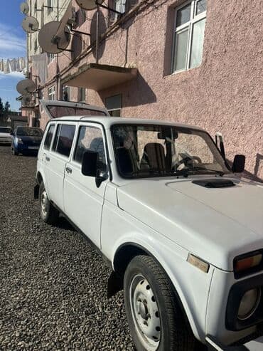 kia islenmis ehtiyyat hisseleri: Lada Niva 2131, ağ rəng, 4 qapılı İli 1999. Yürüş 240380. 1.8 — 7