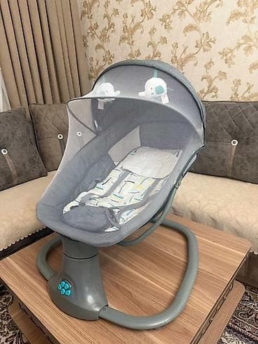 Oğlan və qız üçün, Beşik, Yellənmə mexanizm ilə