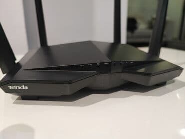 komputer cantasi: Tenda A6C iki diapazonlu Wi‑Fi router. 10 metr kabel hədiyyə — 6