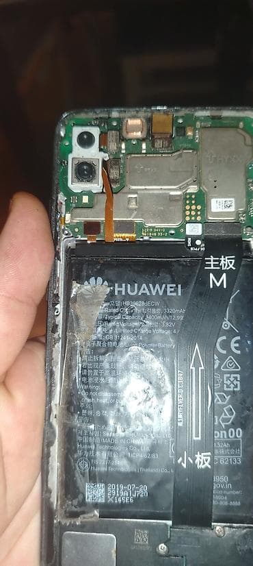 Məhsul: Huawei smartfon (daxili hissələri görünən foto ilə)telefon — 2