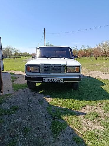 opel vectra 1991 model: VAZ 2107, ağ rəng, sedan gövdə. Xüsusiyyətlər: - 4 qapı, 5 yerlik — 4