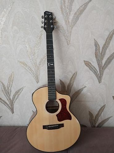 Elektro-akustik gitara – cutaway korpuslu - Korpus: jumbo/GA tipli