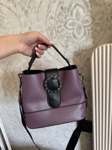 Yenidir. İstifadə olunmayıb. Bənövşəyi rəngdə, qara detalları olan