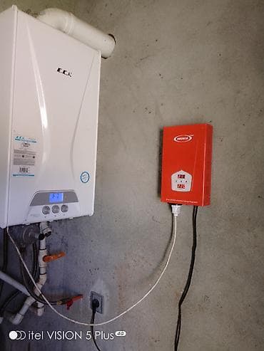 E.C.A divar tipli qaz kombisi və yanında stabilizator. boyuk ev içun