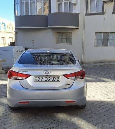 Volkswagen: Hyundai Elantra: 1.6 л | 2012 г. Седан — 7