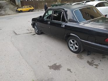 GAZ Volga 3110 sedan - Kuzov: qara rəng, 4 qapı, xrom ön barmaqlıq