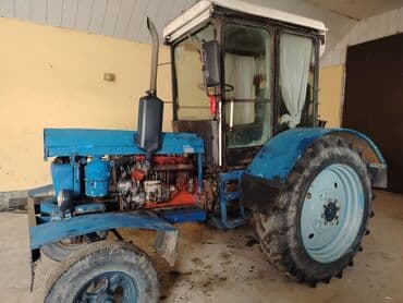 reduktor sürətlər qutusu: Mavi rəngli kabinalı təkərli traktor - Güclü dizel mühərrik (şəkildə — 8