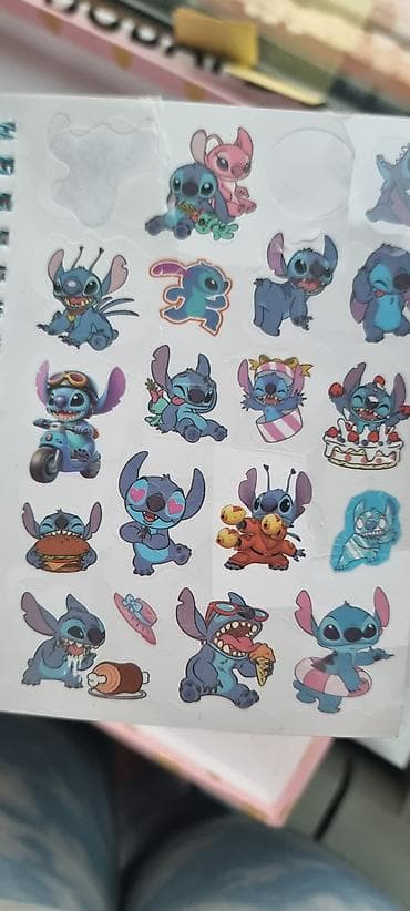 sevgililer ucun hediyyeler: Məhsul: Cizgi qəhrəmanlı yapışqanlı dəftər və stiker dəsti ikisi bir — 4