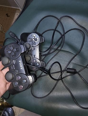 PlayStation 2 (PS2) komplekti - Konsol: Sony PlayStation 2 Slim (üst — 6