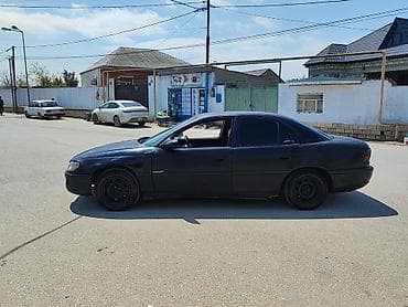 opel astra hatchback 2000: Opel Omega: 2.5 l | 1996 il 432770 km Sedan — 3