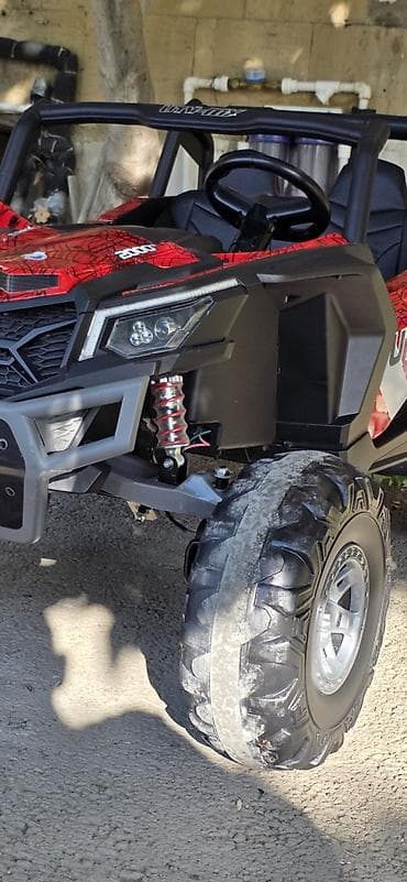 детские вещи на 9 лет: Uşaq elektro UTV buggy - Model üzərində “mx-UTV” və “2000” işarələri — 2