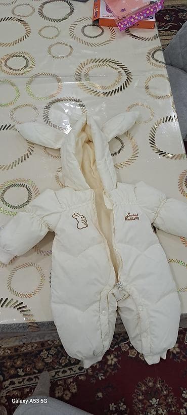 Uşaq üçün qış kombinezonu - Rəng: krem/ivori - Model: qulaqcıqlı
