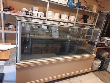 Quru vitrin satılır. Ölçü: 2 metr hündürlük 1.25 Az işlənib, vəziyyəti