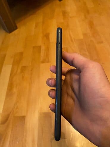 nokia qapaqli telefon: Məhsul: Smartfon (qara rəng) Təsvir: - Korpus: incə profil, qara mat — 1