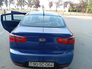 tesla model 3: Kia Rio: 1.4 l | 2013 il Sedan — 7
