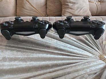 ps4 slim disk: Ps 4 slim 1 tr.tam ela veziyyetde,iki arijinal pult.prasifkali icinde — 1
