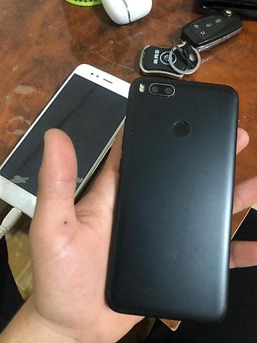oppo find x6 pro: Xiaomi Mi A1, 64 GB, rəng - Qara, 
 Sensor, Barmaq izi, İki sim kartlı — 6
