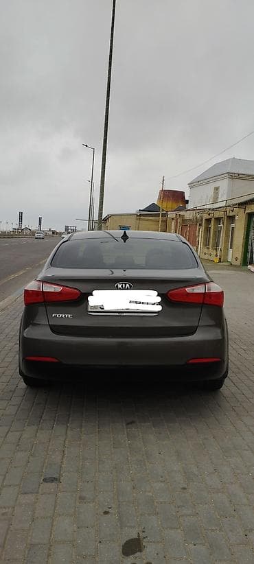авто руль: Kia Forte: 1.8 л | 2013 г. Седан — 3