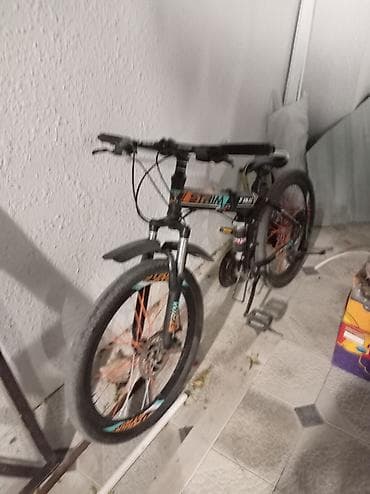 MTB tipli şəhər/dağ velosipedi - Qatlanan gövdə: orta hissədə
