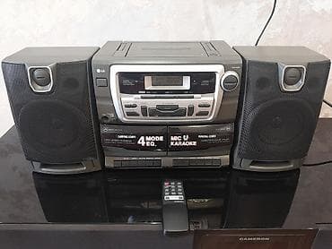 Микрофоны: Musigi mərkəzi LG disk,kaset,radio fm,karaoke pultu var hamisi işliyir — 1