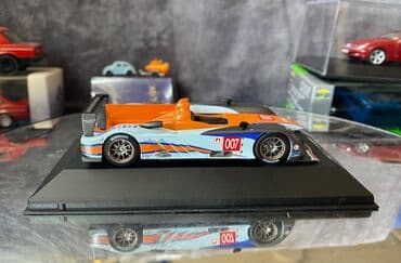где можно продать марки: Коллекционная модель Aston Martin AMR-One #7 Gulf Team LeMans 2011 — 15