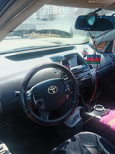 sprinter satisi: Toyota Prius (2-ci nəsil) hibrid hetçbek - Rəng: qara - Kuzov: 5 — 5