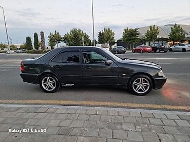 1994 bmw 320: Mercedes-Benz C-Class: 2.2 l | 2000 il Sedan — 2