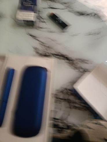 tereson istifade qaydasi: IQOS DUO tütün qızdırma sistemi – mavi rəng Komplekt: - Portativ şarj — 3